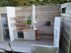 Un intérieur de Tiny house organisé et dont les zones sont bien déterminées.